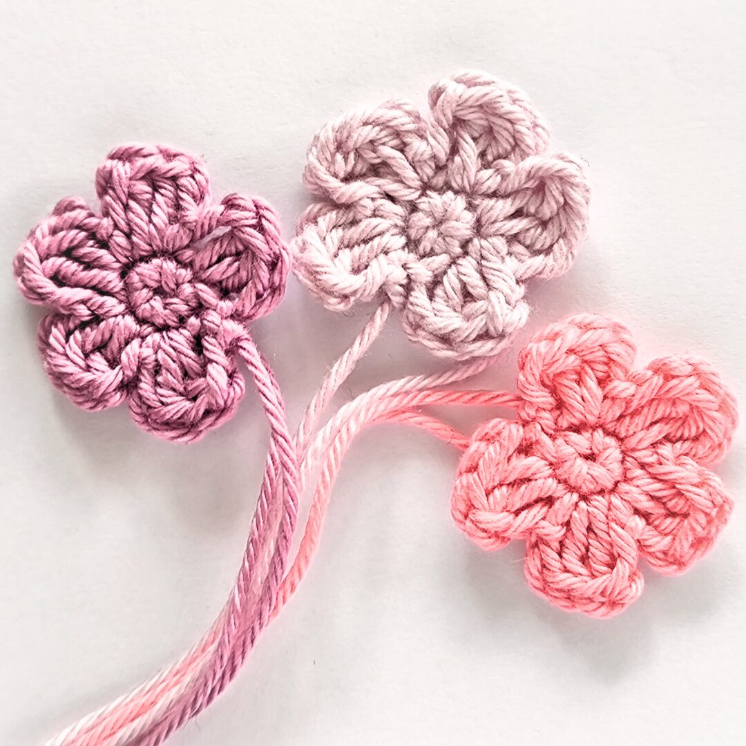 Tiny crochet flowers each crochet tiny flower is made in one of 3 rose shades with white background
